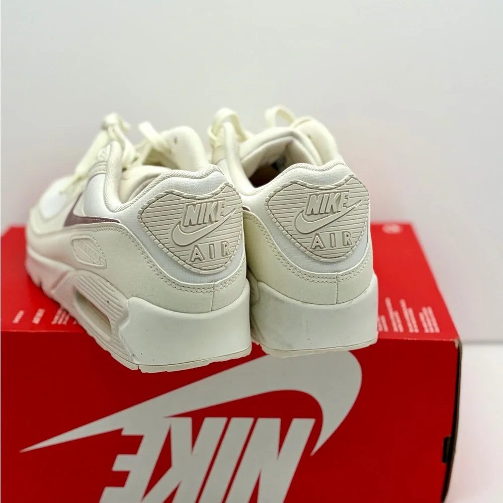 Nike Women's Sneaker in Cream with Pale Pink Swoosh